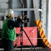 Mass Communication Specialist 2nd Class Charles Gaddis records a replenishment-at-sea evolution aboard the Nimitz-class aircraft carrier USS John C. Stennis (CVN 74).
