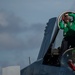 Sailors conduct maintenance on an F/A-18E Super Hornet, with Strike Fighter Squadron (VFA) 151, on the flight deck aboard the Nimitz-class aircraft carrier USS John C. Stennis (CVN 74).