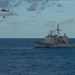 USS Mobile Bay (CG 53) transits the Pacific Ocean during a replenishment-at-sea evolution.