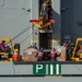 Sailors and civilians aboard the dry cargo and ammunition ship USNS Charles Drew (T-AKE 10) load cargo to send over to the Nimitz-class aircraft carrier USS John C. Stennis (CVN 74) during a replenishment-at-sea.