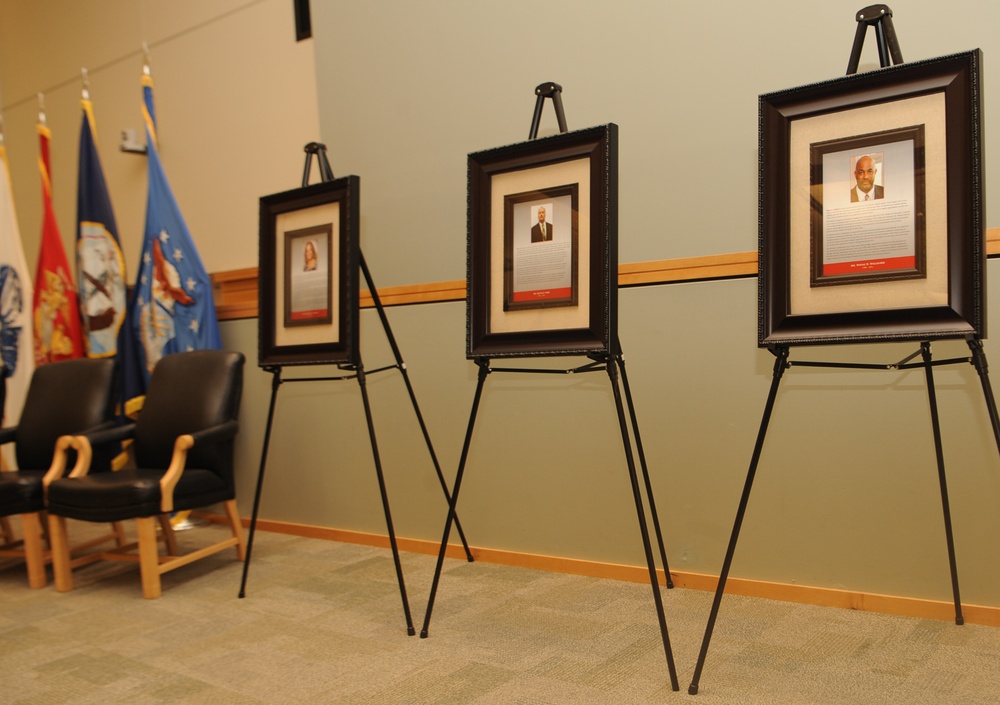 Framed plaques line the stage in preparation for the Defense Logistics Agency Troop Support Hall of Fame induction ceremony Nov. 13, 2018 in Philadelphia.