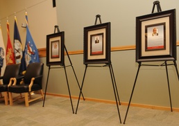 Framed plaques line the stage in preparation for the Defense Logistics Agency Troop Support Hall of Fame induction ceremony Nov. 13, 2018 in Philadelphia.