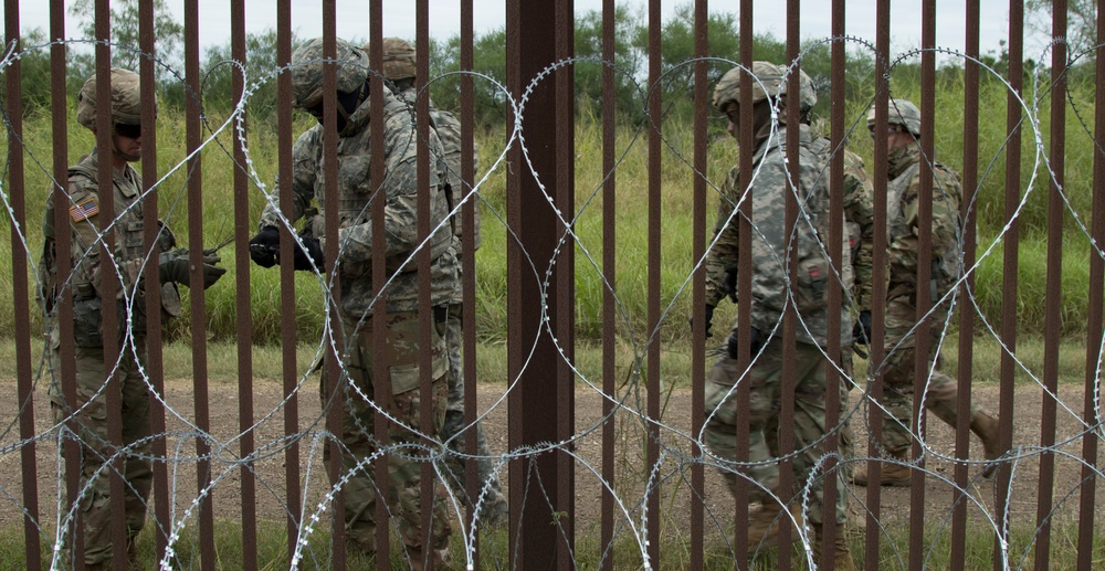 U.S Army Engineers place wire in the Brownsville region