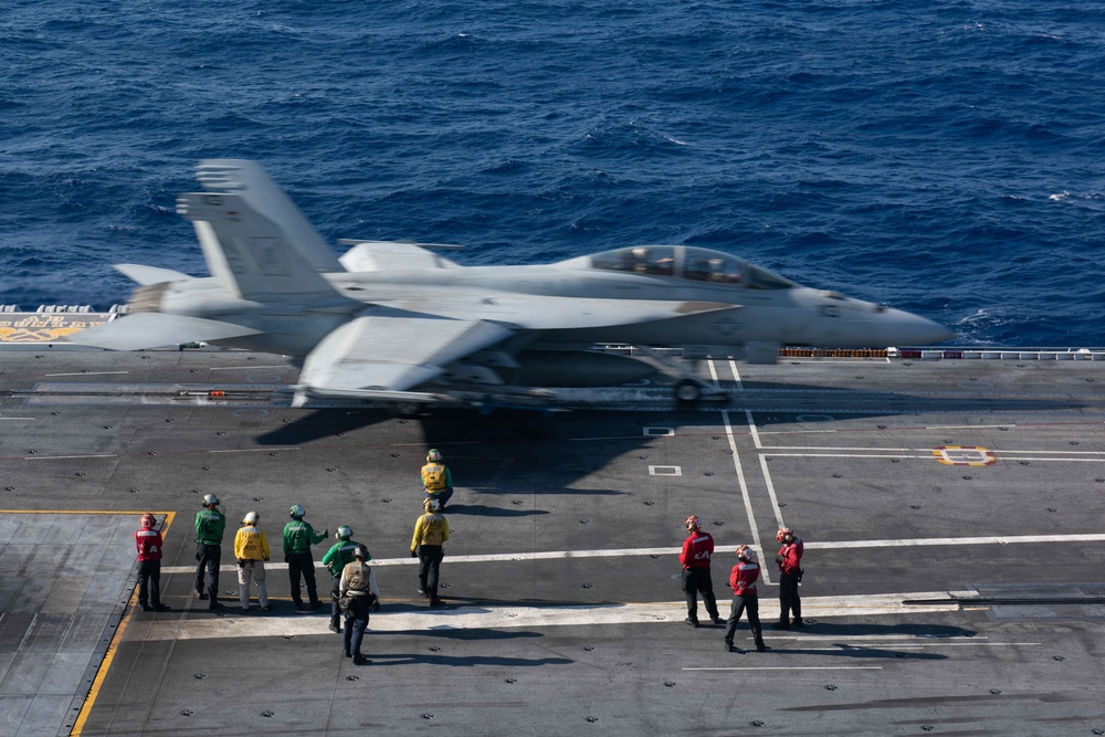 An F/A-18F Super Hornet, with Strike Fighter Squadron (VFA) 41, takes off from the flight deck of the Nimitz-class aircraft carrier USS John C. Stennis (CVN 74).
