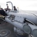 Sailors perform maintenance on the torpedo launch system aboard USS Spruance (DDG 111).