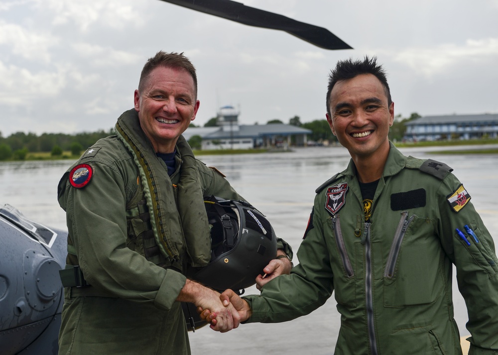Rear Adm. Joey Tynch Pilots a Royal Brunei Armed Forces Helicopter