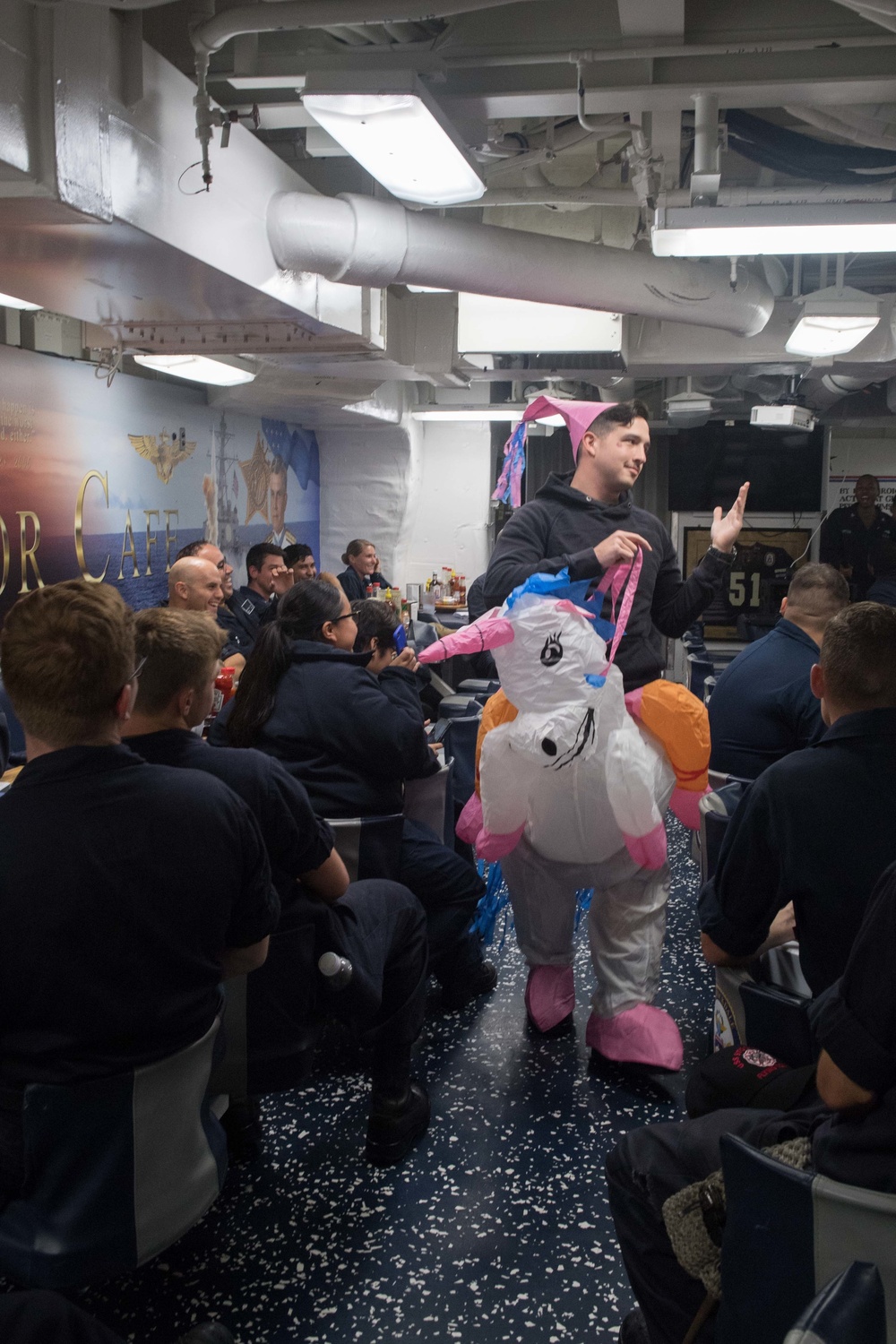 Cryptologic Technician (Technical) 2nd Class Scott Johnson participates in a Morale, Welfare and Recreation (MWR) Halloween costume contest on the mess decks aboard USS Stockdale (DDG 106).