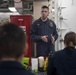 Chief Warrant Officer 3 Byron Gibbs gives training aboard USS Spruance (DDG 111).