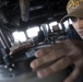 Chief Quartermaster Michele Gosewisch shoots a contact’s bearing as the conning officer in the pilot house aboard USS Spruance (DDG 111).