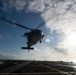 An MH-60S Sea Hawk, with Helicopter Sea Combat Squadron (HSC) 14, approaches the flight deck of USS Spruance (DDG 111).