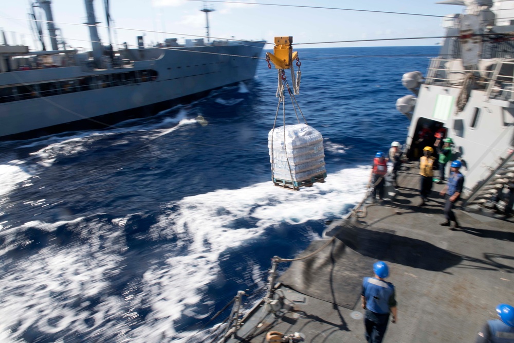 USS Spruance (DDG 111) receives supplies from the Military Sealift Command fleet replenishment oiler USNS Guadalupe (T-AO 200) during a replenishment-at-sea.