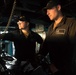 Seaman Matthew Plucinski, right, and Seaman Aaron Kiefer stand watch in the pilot house aboard USS Chung-Hoon (DDG 93).