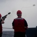 Gunner’s Mate  3rd Class Kent Bardield shoots a shot line from USS Stockdale (DDG 106) during a replenishment-at-sea.