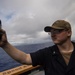 Quartermaster 3rd Class Nathaniel Bailey uses a Kestrel to determine the air temperature aboard USS Mobile Bay (CG 53).