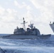 USS Mobile Bay (CG 53) practices an emergency breakaway following a replenishment-at-sea with USNS Guadalupe (T-AO 200).