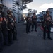 Sailors stand by to secure aircraft with chains during flight operations on the flight deck aboard USS John C. Stennis (CVN 74).