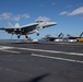 An F/A-18E Super Hornet, with Strike Fighter Squadron (VFA) 14, lands on the flight deck aboard USS John C. Stennis (CVN 74).