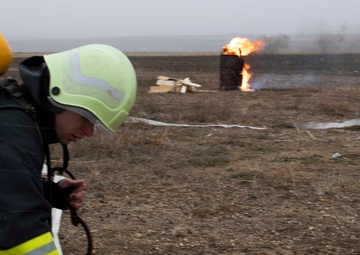 336th Engineer Detachment firefighters join Canadians, Romanians in plane crash emergency response exercise