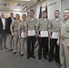 NSWC Commander and Executive Director present Awards after Hurricane Michael
