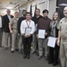 NSWC Commander and Executive Director present Awards after Hurricane Michael