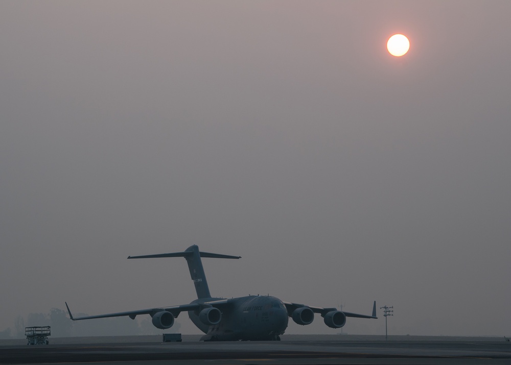 Smoke sunrise on the Travis flight line