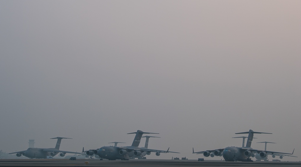 Smokey sunrise on the Travis flight line