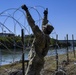 Soldiers lay concertina wire along Laredo Juarez-Lincoln border