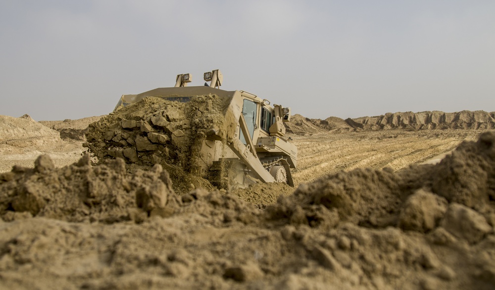 Soldiers and Firefighters Clean up After Flooding at Camp Arifjan