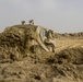 Soldiers and Firefighters Clean up After Flooding at Camp Arifjan