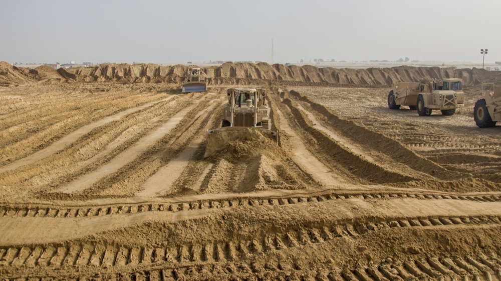 Soldiers and Firefighters Clean up After Flooding at Camp Arifjan