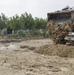 Soldiers and Firefighters Clean up After Flooding at Camp Arifjan