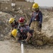 Soldiers and Firefighters Clean up After Flooding at Camp Arifjan