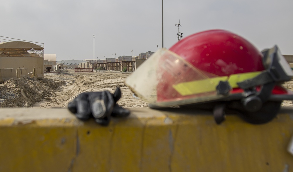 Soldiers and Firefighters Clean up After Flooding at Camp Arifjan