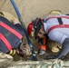 Soldiers and Firefighters Clean up After Flooding at Camp Arifjan