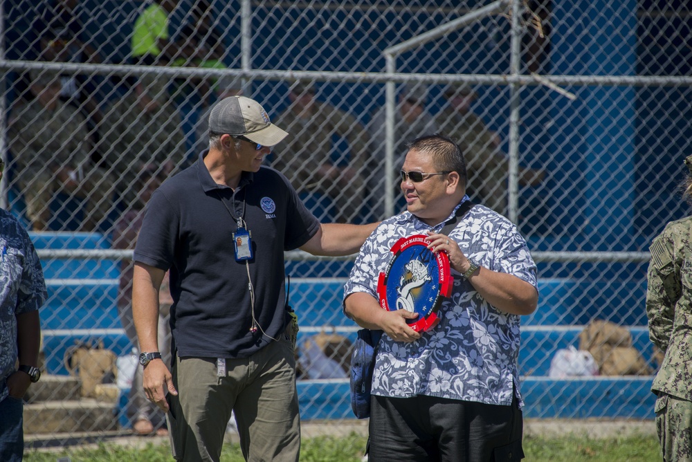 Mayor of Tinian Receives Plaque during Ceremony Honoring Relief Efforts