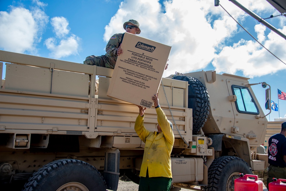 Military Provides Aid to Survivors Impacted by Super Typhoon Yutu