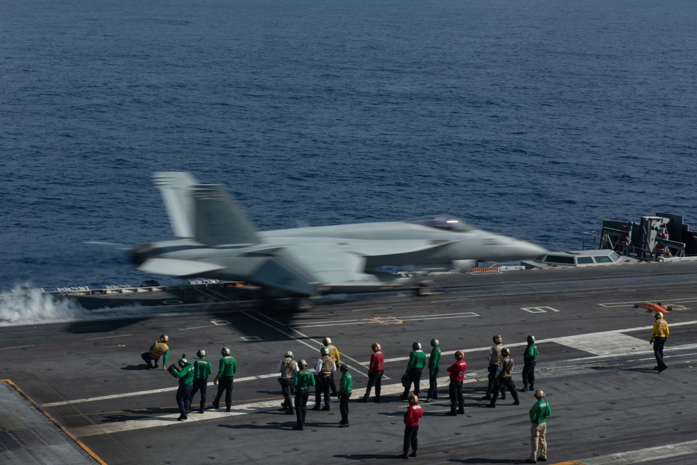 An F/A-18E Super Hornet, with Strike Fighter Squadron (VFA) 14, takes off from the flight deck aboard USS John C. Stennis (CVN 74).