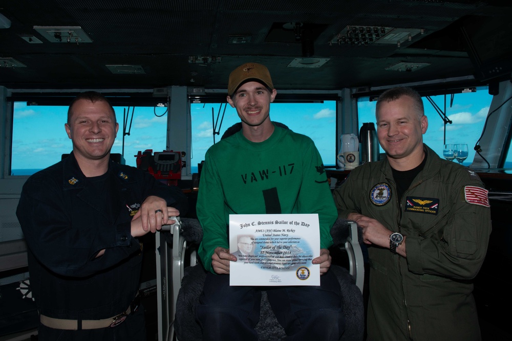 Aviation Structural Mechanic (Equipment) 3rd Class Blaine Rickey poses for a photograph as the Sailor of the Day aboard USS John C. Stennis (CVN 74).