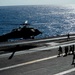 n MH-60S Knight Hawk, with Helicopter Sea Combat Squadron (HSC) 14, prepares to land on the flight deck aboard  USS John C. Stennis (CVN 74).