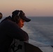 Seaman Apprentice Elijah King stands watch aboard USS John C. Stennis (CVN 74).