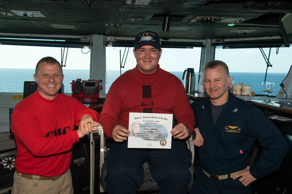 Aviation Ordnanceman 3rd Class Dylan Drake poses for a photograph as the Sailor of the Day aboard USS John C. Stennis (CVN 74).