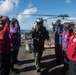 Commander, Carrier Strike Group 3, Rear Adm. Mike Wettlaufer, is piped aboard on the flight deck of USS Chung-Hoon (DDG 93).