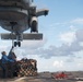 Sailors attach pallets to an MH-60R Sea Hawk, with Helicopter Maritime Strike Squadron 37, aboard USS Chung-Hoon (DDG 93) during a vertical replenishment.