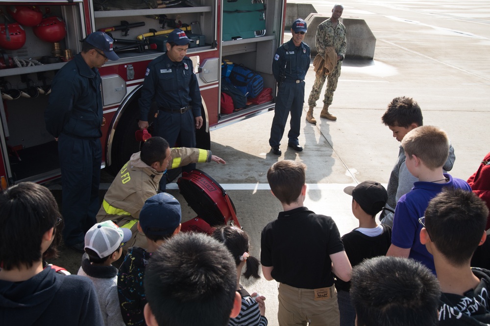 Children take a tour of Naval Beach Unit 7 facilities