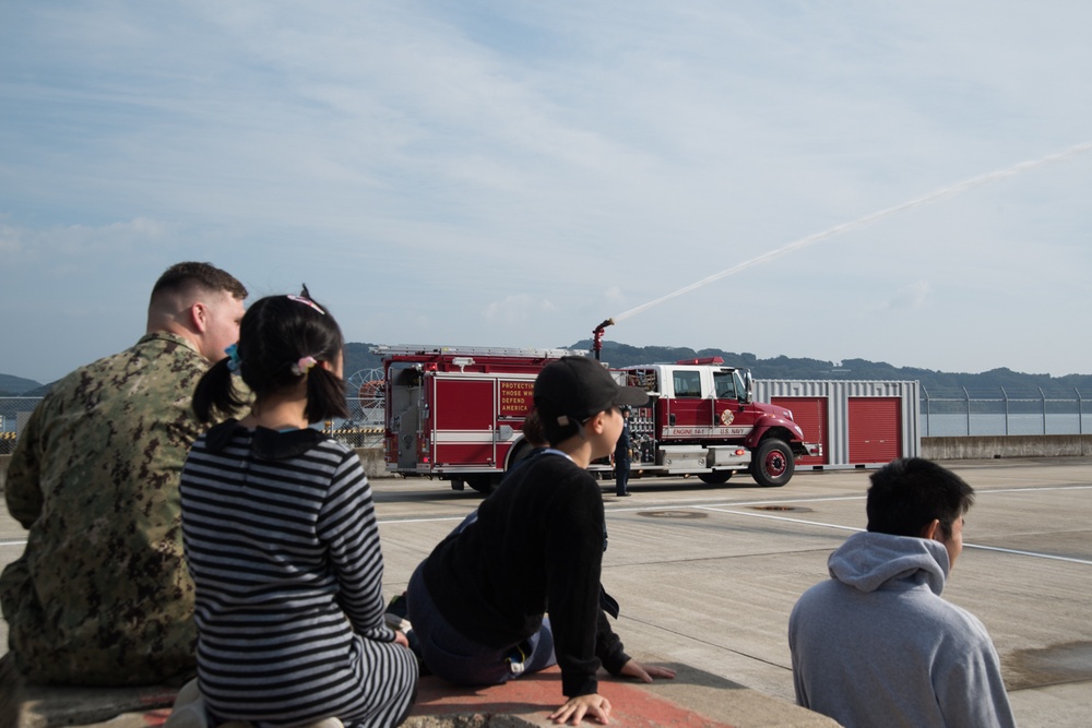 Children take a tour of Naval Beach Unit 7 facilities