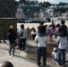 Children take a tour of Naval Beach Unit 7 facilities