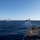 USS Spruance (DDG 111) cuts through the Philippine Sea in formation with USS Mobile Bay (CG 53), left, USS John C. Stennis (CVN 74) and USS Ronald Reagan (CVN 76), and USS Chancellorsville (CG 62), right.