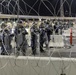 U.S. Customs and Border Protection officials temporarily suspended some operations at the San Ysidro port of entry early Monday morning