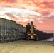 U.S. Border Patrol stands watch during border fence reinforcement