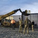 U.S. Border Patrol stands watch during border fence reinforcement